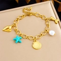 Pulsera marina de acero inoxidable bañada en oro de 18K con estrellas y conchas - Estilo Dorado de la Serie Océano (B1674)