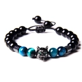 Detailed view of wolf head bead bracelet with black onyx and blue tiger eye natural stones - Type A Obsidian + Light Blue Tiger Eye