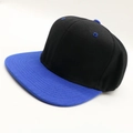 Classic black hip-hop cap with contrast blue flat brim in a professional side view - One Size / Black + Royal Blue Brim