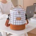 Cylindrical insulated lunch bag with black grid pattern and brown shoulder strap - Brown
