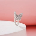 Silver butterfly non-pierced nose clip with zircon inlay on a pink background - Pave Zirconia Butterfly Style (WG-0735)