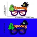 Neon Halloween glasses with purple frame, spooky ghost and glowing wizard hat detail - Ghost Spooky Witch Hat Style