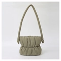 Detail of green puffy nylon bucket bag showing soft quilted texture and knotted strap design - Army Green