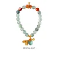 Detailed view of strawberry crystal beaded bracelet with green jade and gold bell charms - Green Aventurine Agate Style (WB335)
