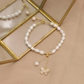 Elegant natural pearl bracelet featuring gold-tone metal beads and a butterfly charm - GN0281 Set Bracelet