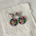 Close-up of double-layered round silver earrings with colorful zircon stones on white paper - Silver Base Rainbow Rhinestone
