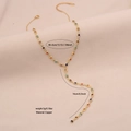 Golden Y-shaped necklace featuring multicolored square crystal gemstones and copper chain - Square