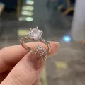 Macro shot of silver six-prong engagement ring with side diamonds and adjustable band - TJZ194-Classic Six-Prong Opening