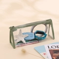 Transparent PVC pencil case with green fabric trim and top zipper for stationery - Green