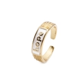 Macro detail of adjustable gold ring with white enamel and HOPE letter inscription - White / Adjustable Open