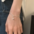 Silver twisted rope bracelet with round charm for women in minimalist Korean style - Twisted Rope Round Tag Style (SL1361)