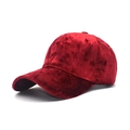 Detailed close-up of a burgundy velvet baseball cap with a classic curved brim design - Adjustable / Burgundy
