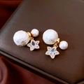 Macro shot of double-pearl star earrings with gold plating and sparkling zircon stones - Star Pearl Earrings (Gold Plated Silver Pin) / Gold-Beige