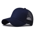 Close-up side view of navy blue breathable mesh and cotton fabric on trucker hat - Adjustable / Navy Mesh