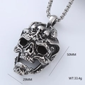 Macro shot of punk style steel skull pendant showing dimensions 50mm height and 29mm width - Style E Single Pendant