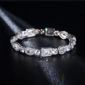Macro shot of silver plated bracelet with mixed-cut zirconia stones on dark background - Geometric Mixed Cut Style (KSB00165) / White