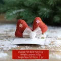 Handmade orange felt Christmas bow hair clip with snowflakes and white mesh ball - Orange Felt Bow Hair Clip