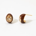 Detail of oval enamel earrings with brown glaze, central zircon, and gold-plated borders - Coffee