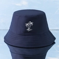 Detail of white coconut tree embroidery on a navy blue cotton Y2K bucket hat - One Size / Navy Blue