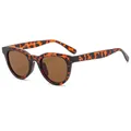 Fashionable leopard print sunglasses with deep brown lenses and retro cat-eye frame design - Leopard Frame / Tea Lens