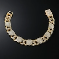 Gouden Cubaanse schakelketting met hartjes en strass steentjes op zwarte spiegeling - Armband / 8 inch / Goud