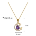 Macro detail of purple waterdrop stone and gold moon pendant with 2cm measurement scale - Purple Water Drop Moon Style (G112)