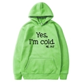 Light green long sleeve hoodie featuring the slogan Yes I'm Cold ME 24:7 in black font - S / Hooded / Fruit Green