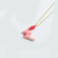 Gold balloon letter necklace featuring tricolor red and pink enamel wave pendant - Letter W