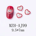Close-up of heart-shaped nail charm with 520 engraving and red rhinestones, 9.5x7mm - 520 Number Heart (AJ99)