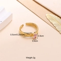 Golden twisted rope ring with oval pink zircon stone minimalist jewelry accessory - Pink