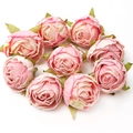 Nueve cabezas de rosas de seda rosa dispuestas en círculo sobre un fondo blanco - #17 Rosa de borde quemado (Pack de 9)