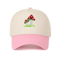 Close-up of mushroom embroidery on a two-tone beige and pink cotton baseball cap - Adjustable / Pink