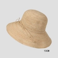 Dettaglio della tesa da 10 cm di un cappello in paglia rafia con fiocco decorativo - M (56-58cm) / Tesa da 10cm