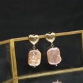 Vintage heart shaped gold earrings with pink baroque pearls on a glass stand - Heart Stud Purple Square Baroque