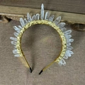Golden bridal headband with natural clear crystals shown on a vintage wood background - White Crystal/Gold Edge