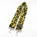 Close-up of leopard print bag strap with silver metal swivel hooks and adjustable buckle - Yellow Webbing with Silver Buckle