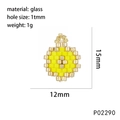Detail view of handmade glass bead pendant with star and moon patterns and dimensions - Round/Flower / Yellow (Round)