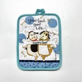 Thick cotton pot holder with happy dog illustration and convenient hanging loop - Cow