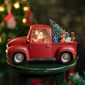 Caja de música navideña en camión rojo vintage con Papá Noel y efectos de nieve y luz - Camión de Oso