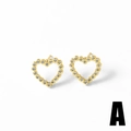 Minimalist heart stud earrings in 18k gold plating featuring open heart pavé cubic zirconia - Hollow Heart Style (A)