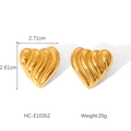 Macro shot showing dimensions of textured gold heart earrings, 2.71cm wide and 2.61cm high - Gold (HC-E10352)