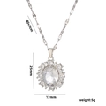 Elegant oval crystal zircon pendant necklace with silver chain shown in a clear front view - 577 Silver White Zircon Necklace