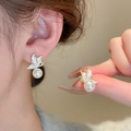 Elegant gold butterfly stud earrings with white pearls for women on model ear - Butterfly with Single Pearl Stud Earrings - Gold White (34#)