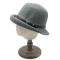 Detailed view of grey wool cloche hat with black leather strap and golden buckle - M(56-58cm) / Gray