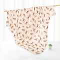 Bamboo cotton gauze baby swaddle blanket featuring cute brown animal print on beige fabric - Dog