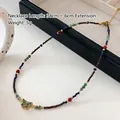 Ethnic beaded tiger eye necklace with butterfly pendant and golden metal spacers - Lapis Lazuli Necklace XL0725