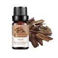 LurnaoQueen 10ml pure oud essential oil in a dark glass bottle with oud wood chips - Agarwood Single Remedy