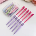 Pink and purple hair root clips for volume in a clear storage box on a white desk - 5 Purple + 5 Rose Red (Boxed + Certificate)