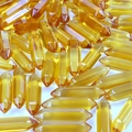 Translucent yellow hexagonal crystal bullet pendants made of polished natural quartz - Transparent Yellow