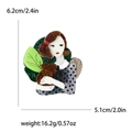 Cartoon acrylic brooch of girl hugging rabbit with glitter leaves and size specs - Colorful